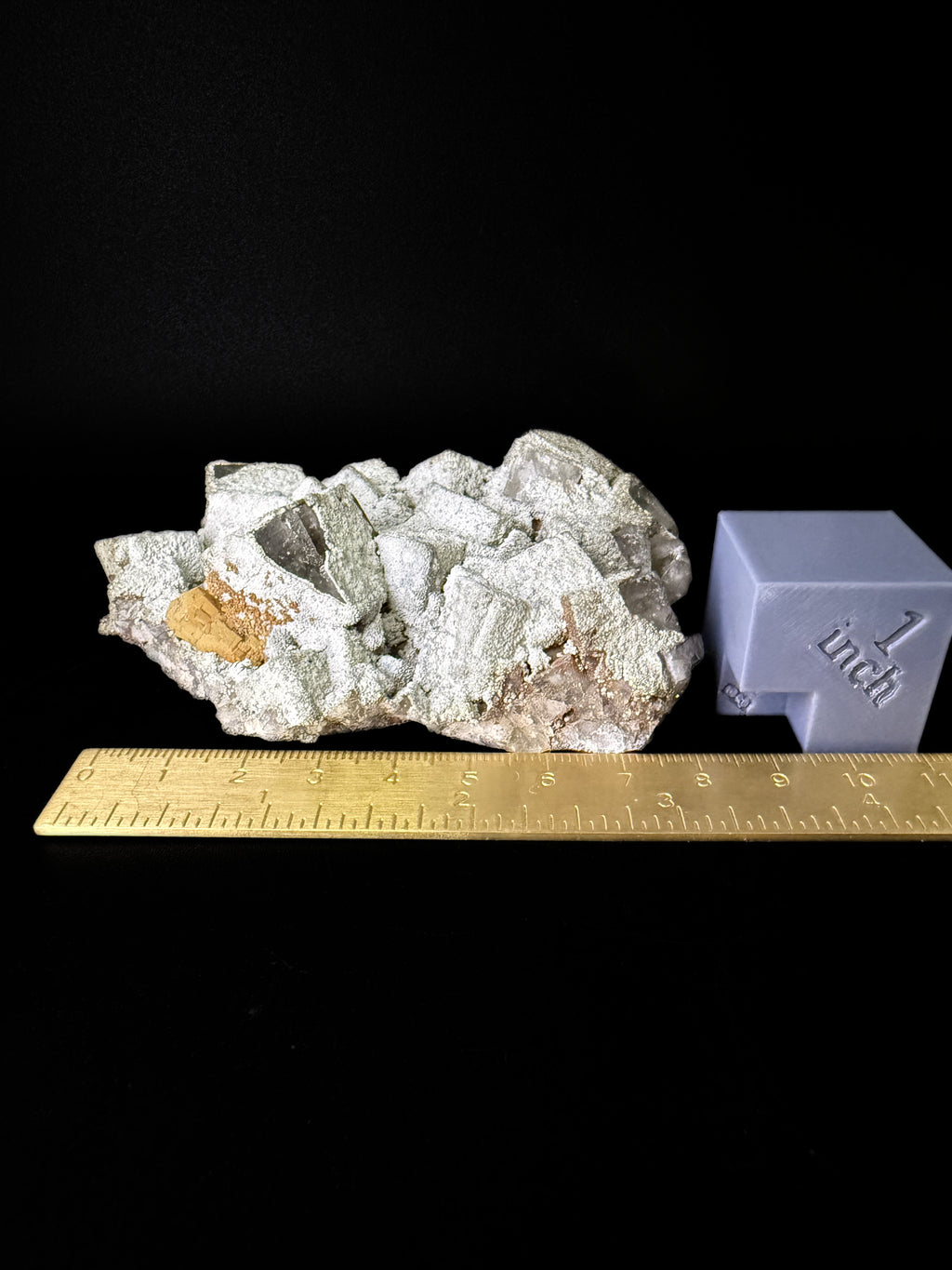 Pyrite on Fluorite