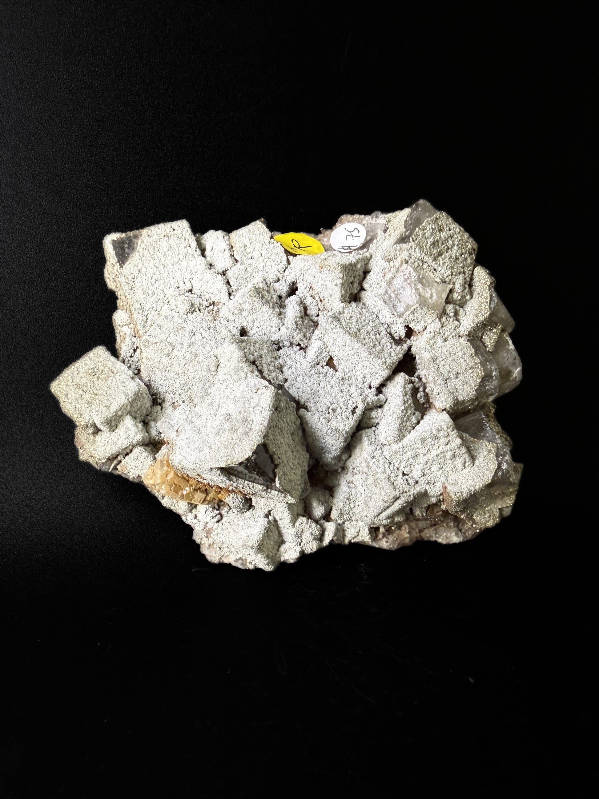 Pyrite on Fluorite