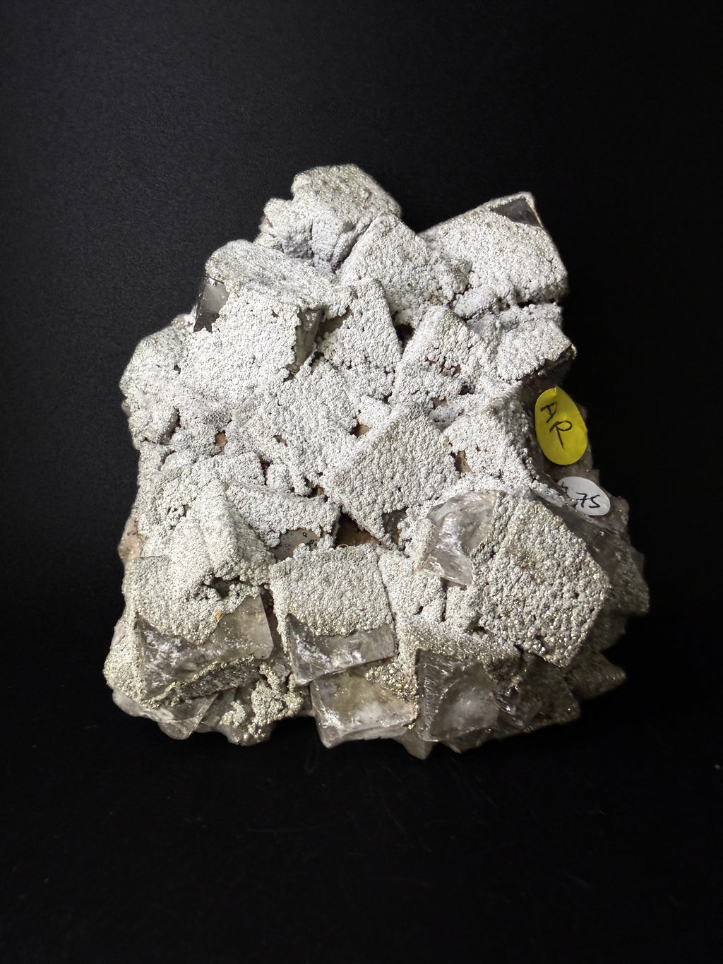Pyrite on Fluorite