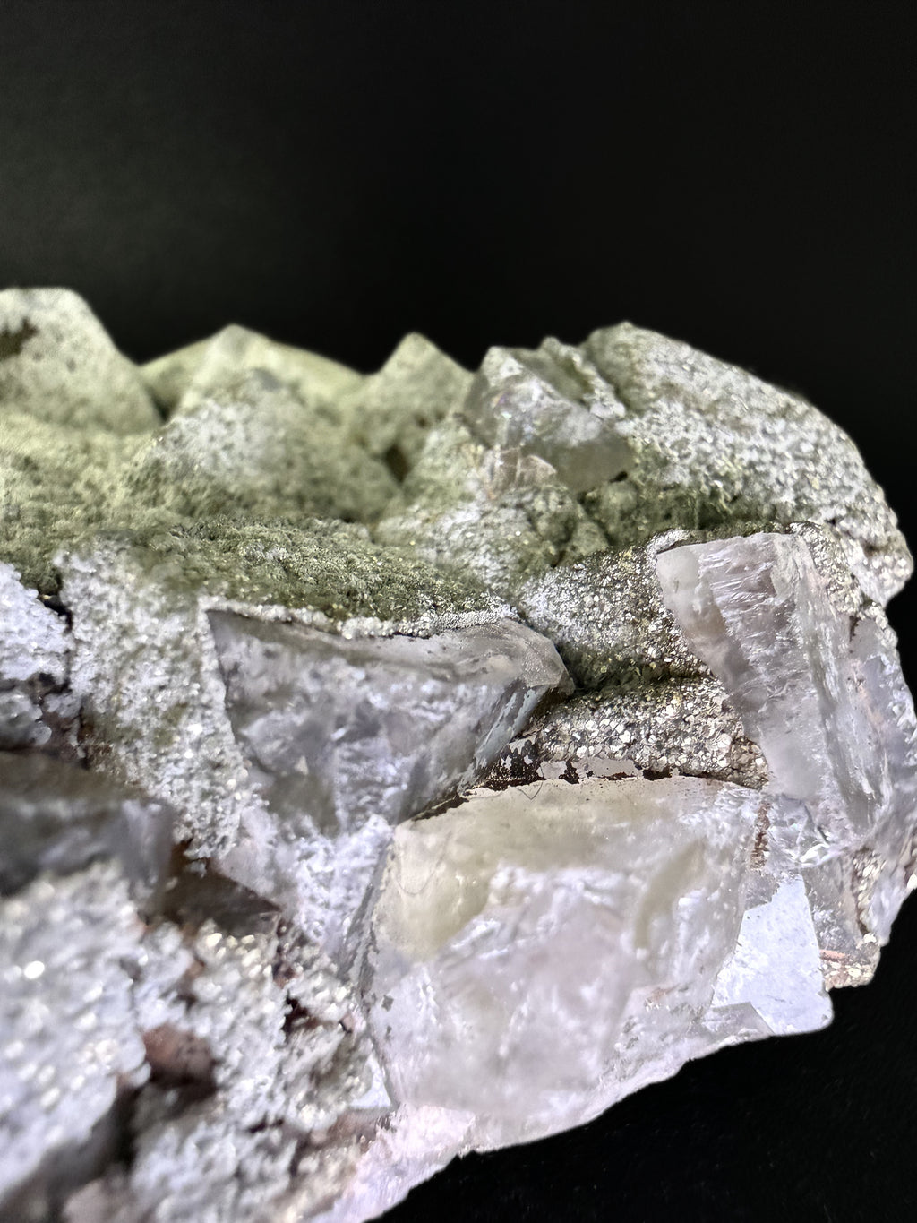 Pyrite on Fluorite