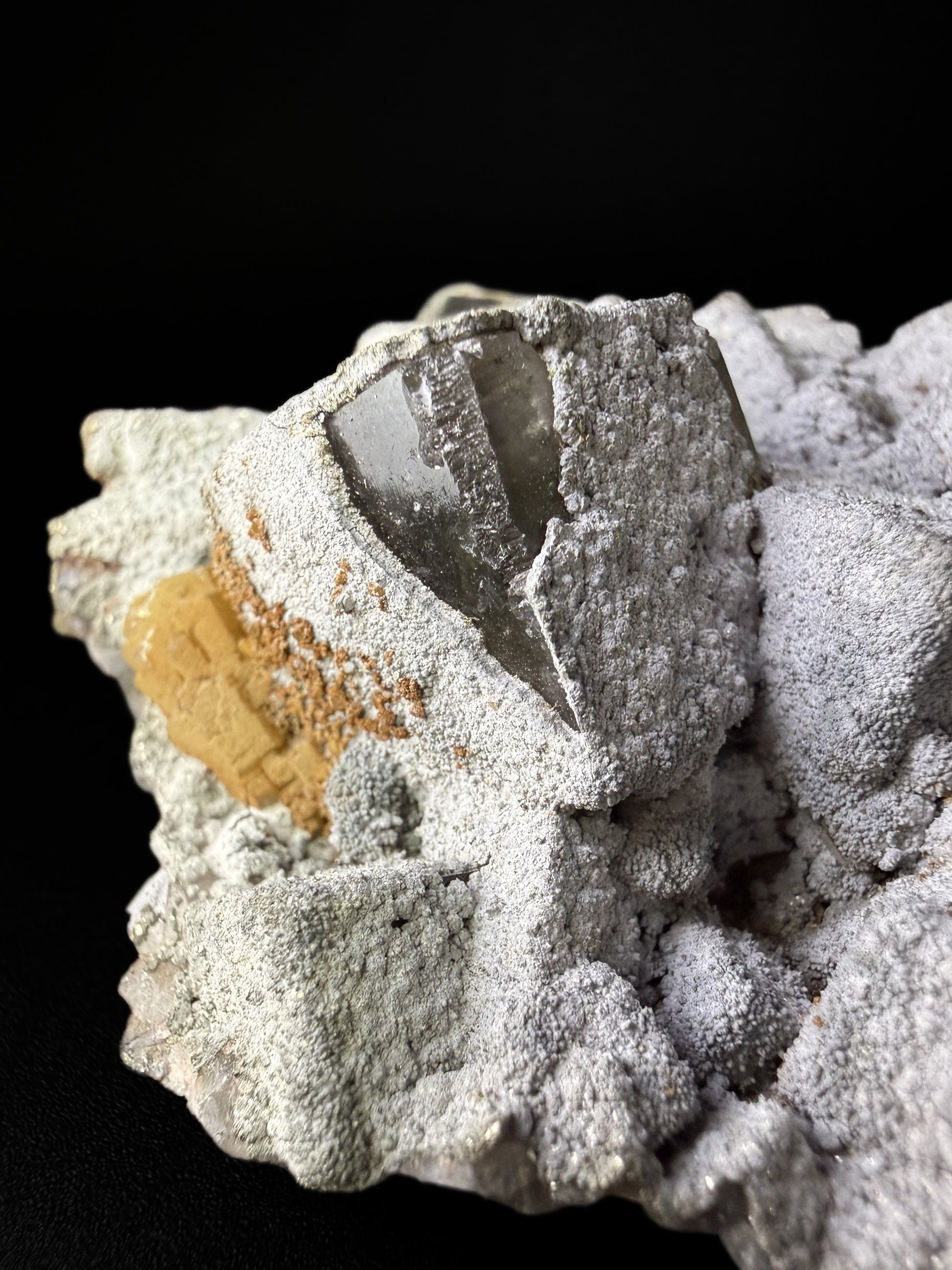 Pyrite on Fluorite