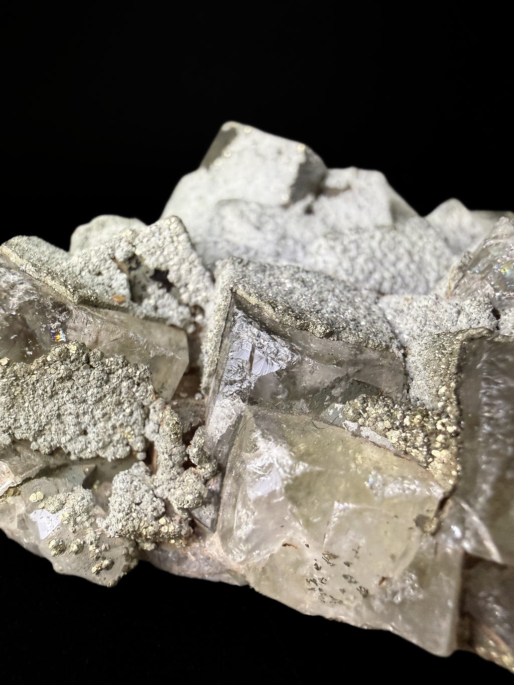 Pyrite on Fluorite