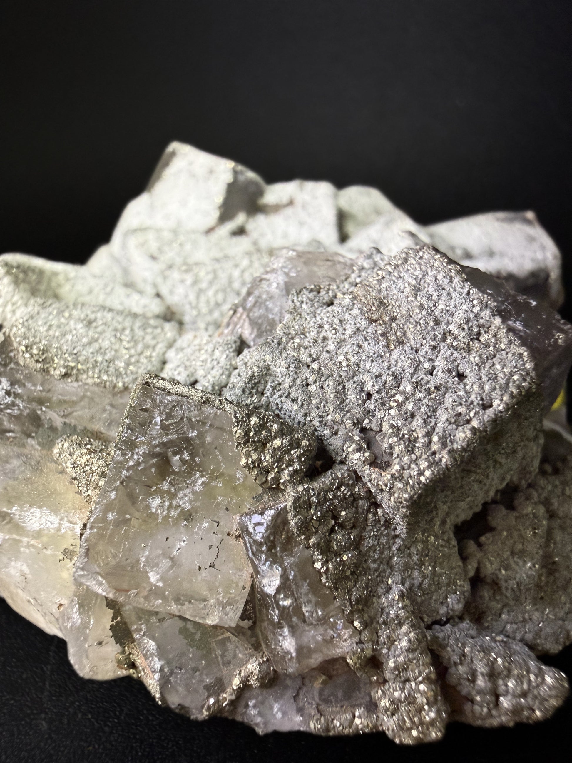 Pyrite on Fluorite