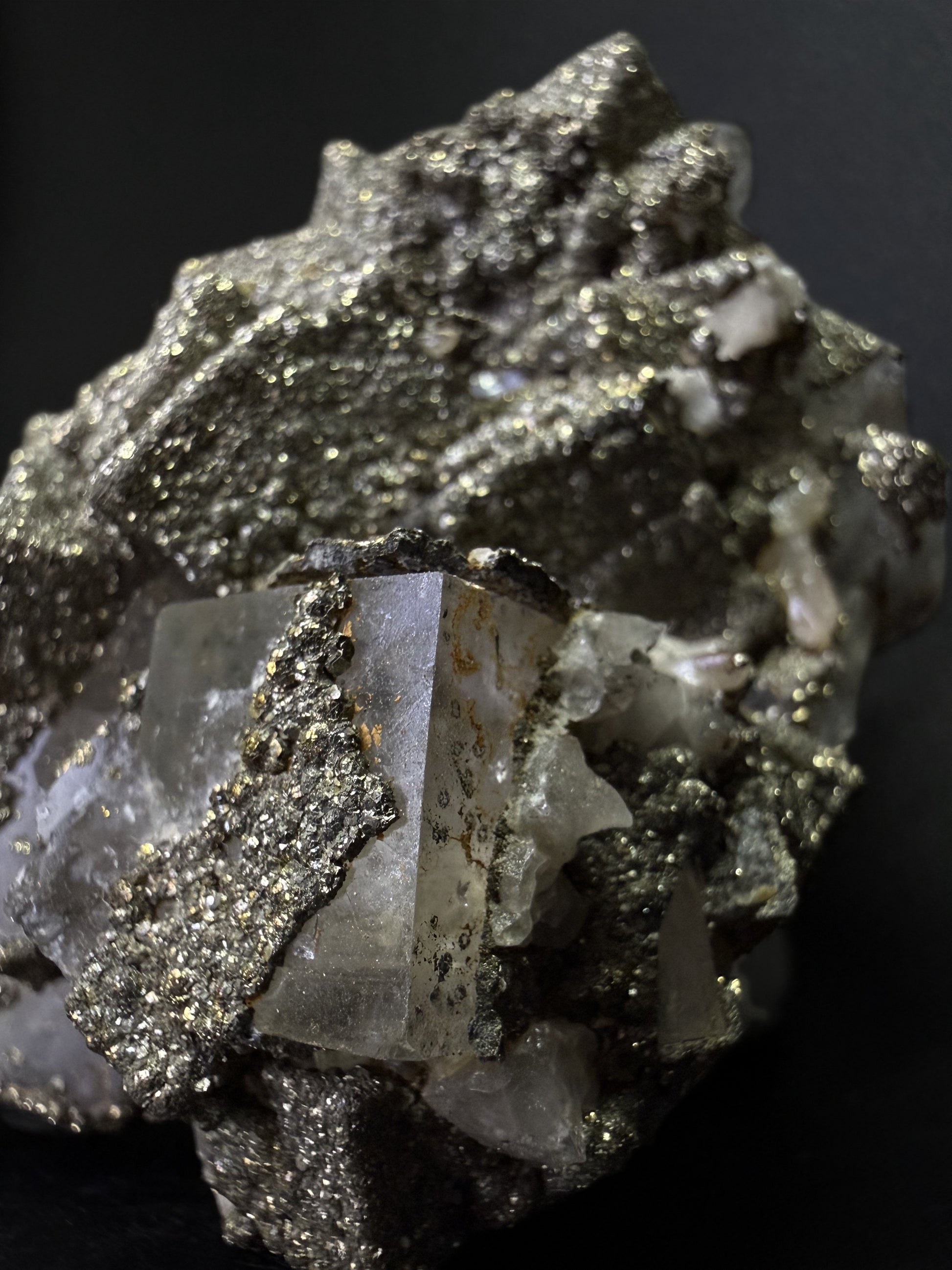 Pyrite on Fluorite