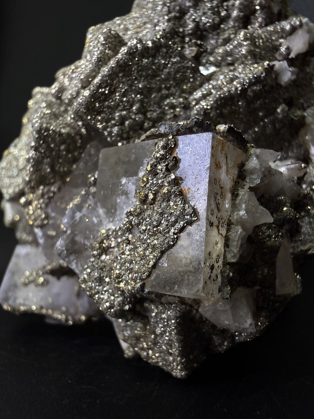 Pyrite on Fluorite