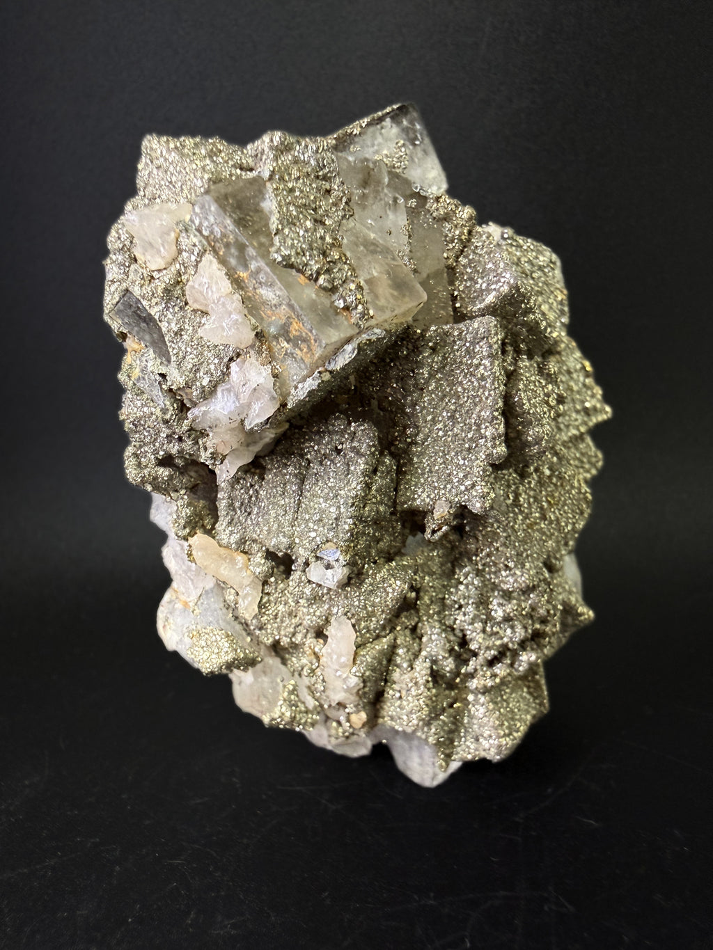 Pyrite on Fluorite