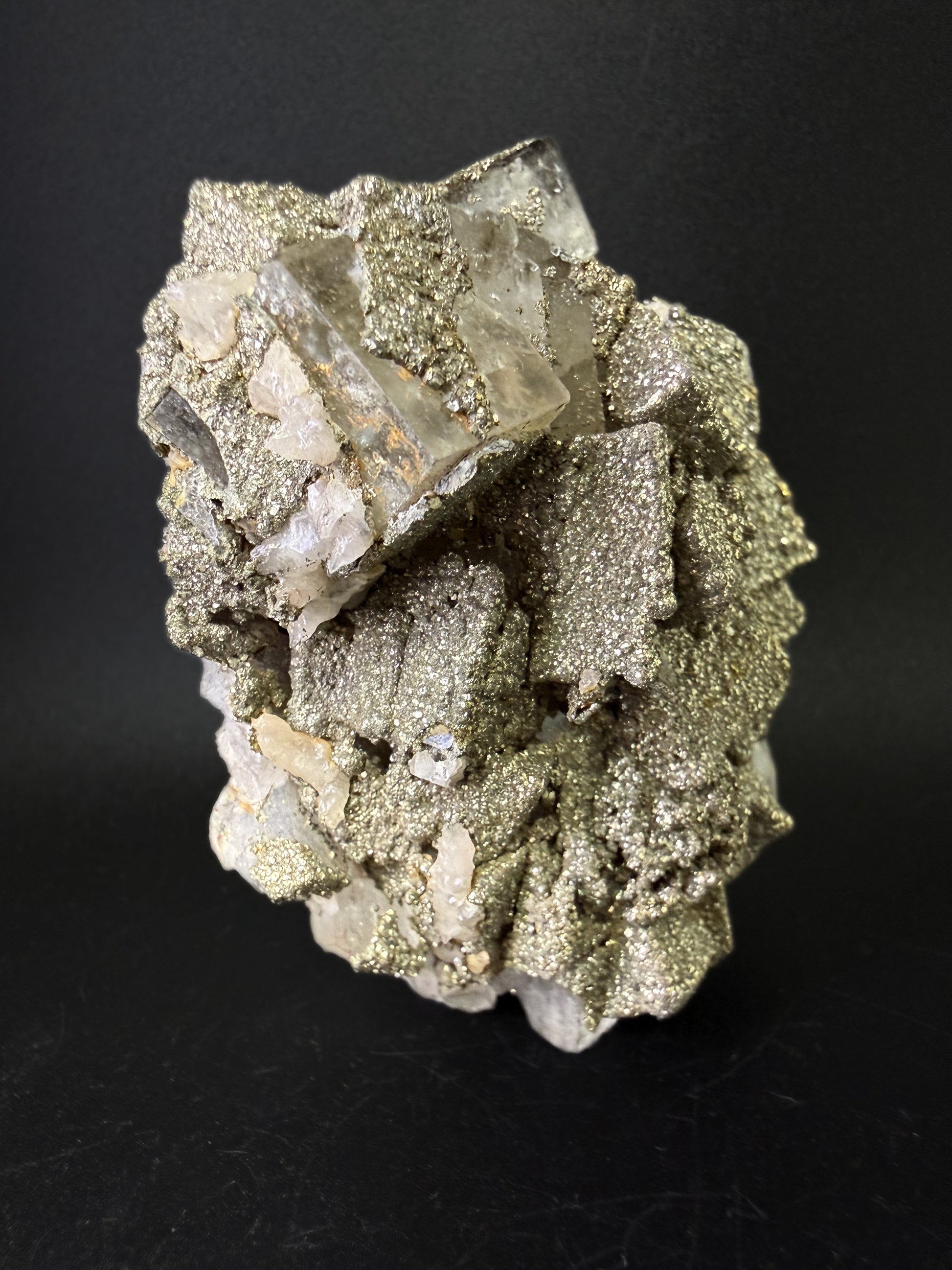 Pyrite on Fluorite